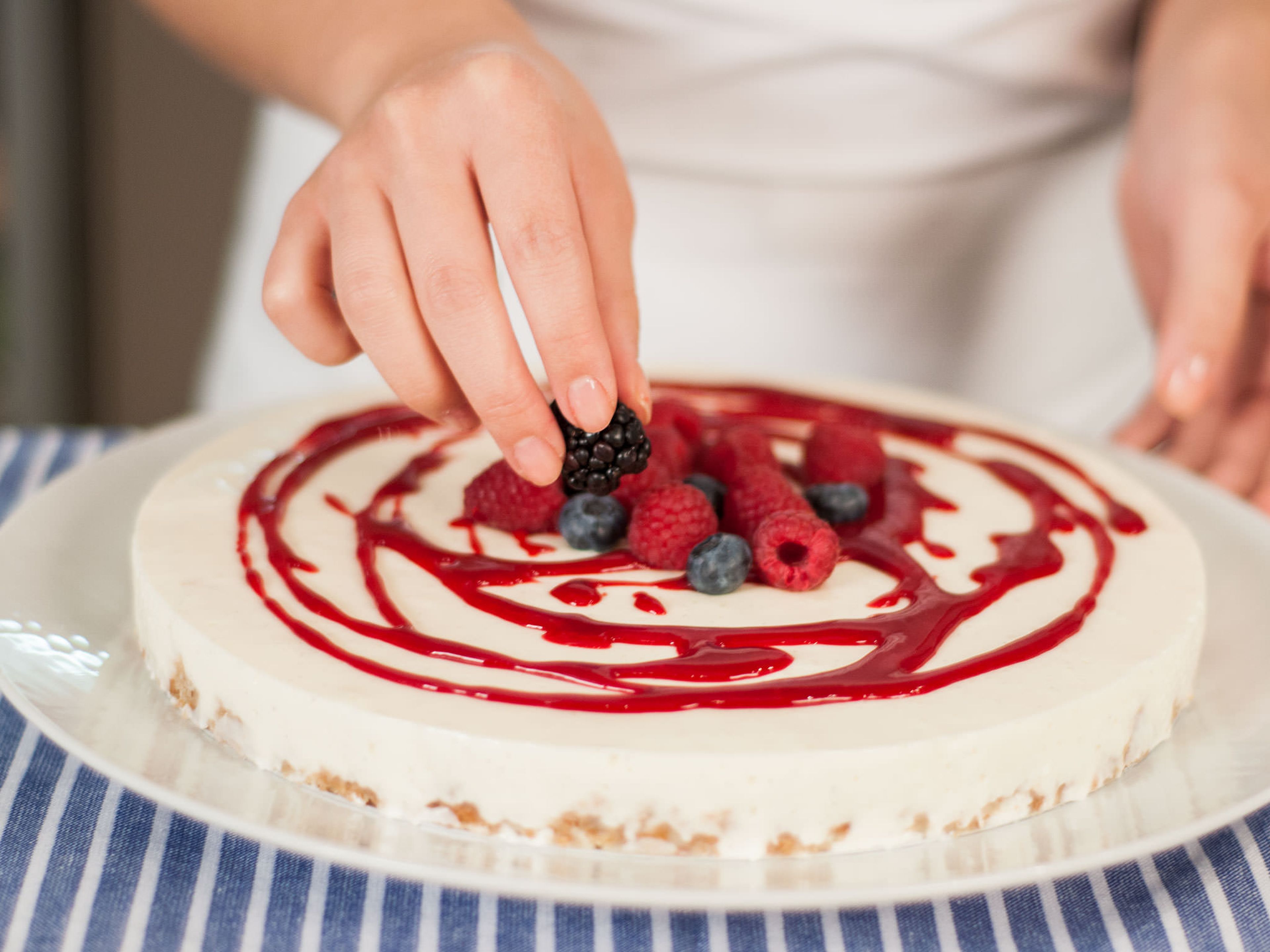 Drizzle cake with raspberry sauce. Top with fresh berries and basil. Enjoy with a cup of tea or coffee!