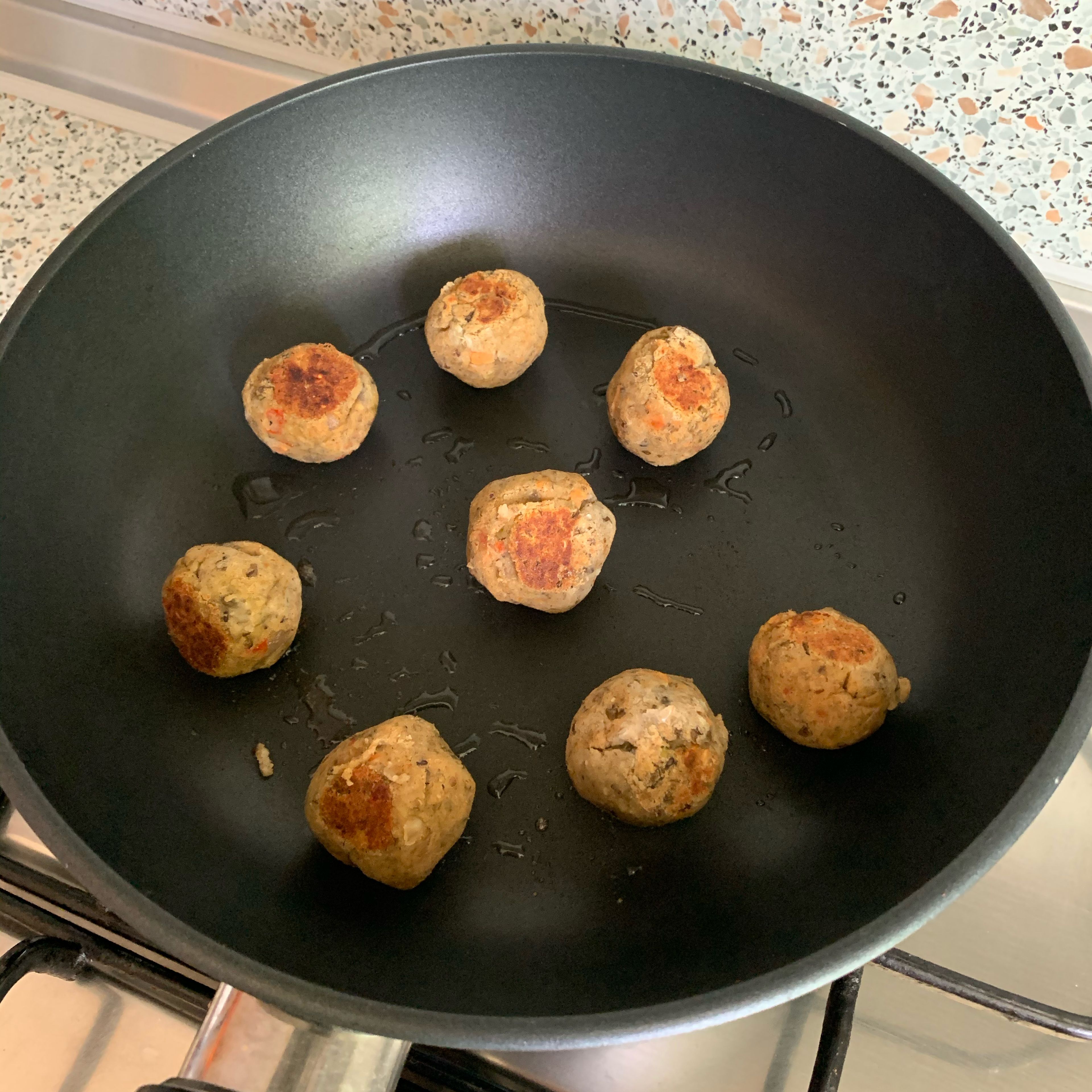 Take about a walnut size from the mixture and make balls. Fry on a pan a little on olive oil or coconut butter ( as I prefer).