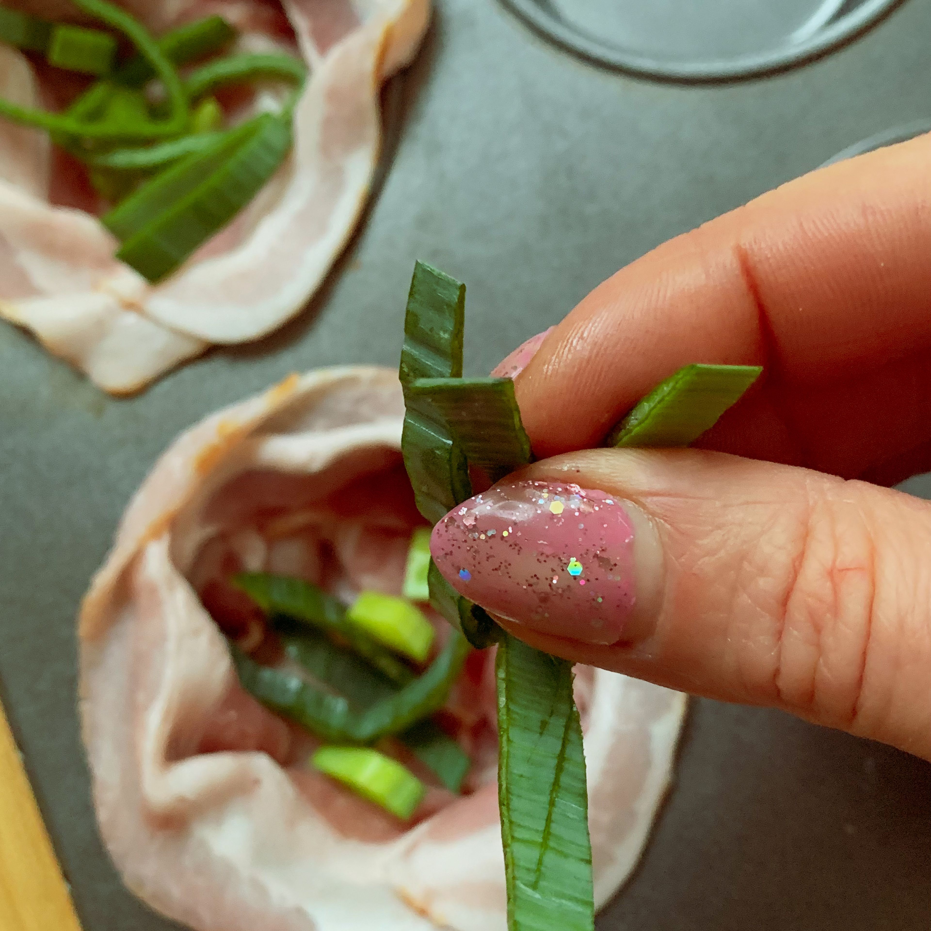 Add the clean leeks to these cute little nestes and shake a little cayenne dust to each. If you don’t want spicy breakfast, leave it out, no problem.