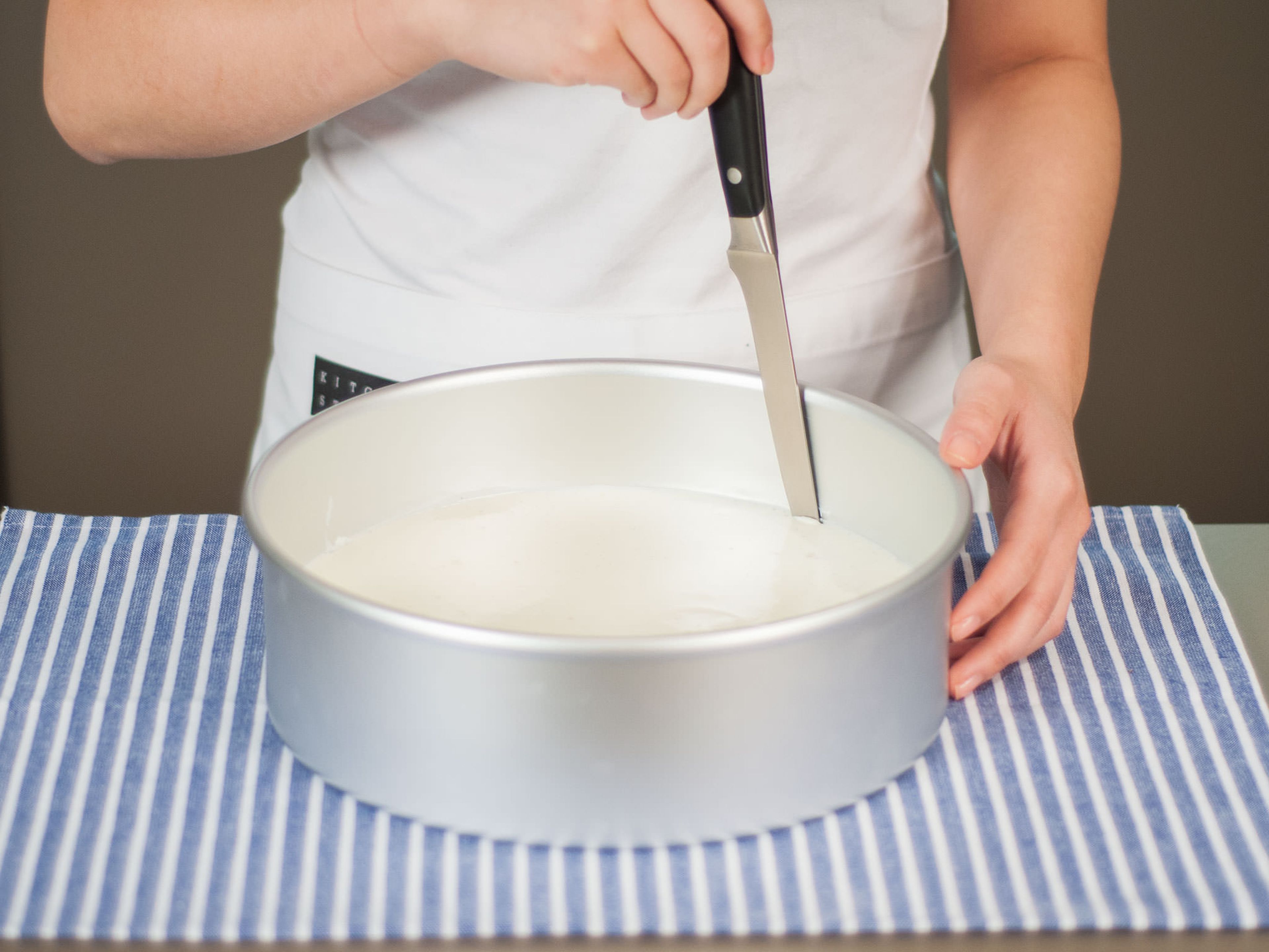 Carefully run knife around the edges of the baking form. Remove cake and transfer to a cake platter.