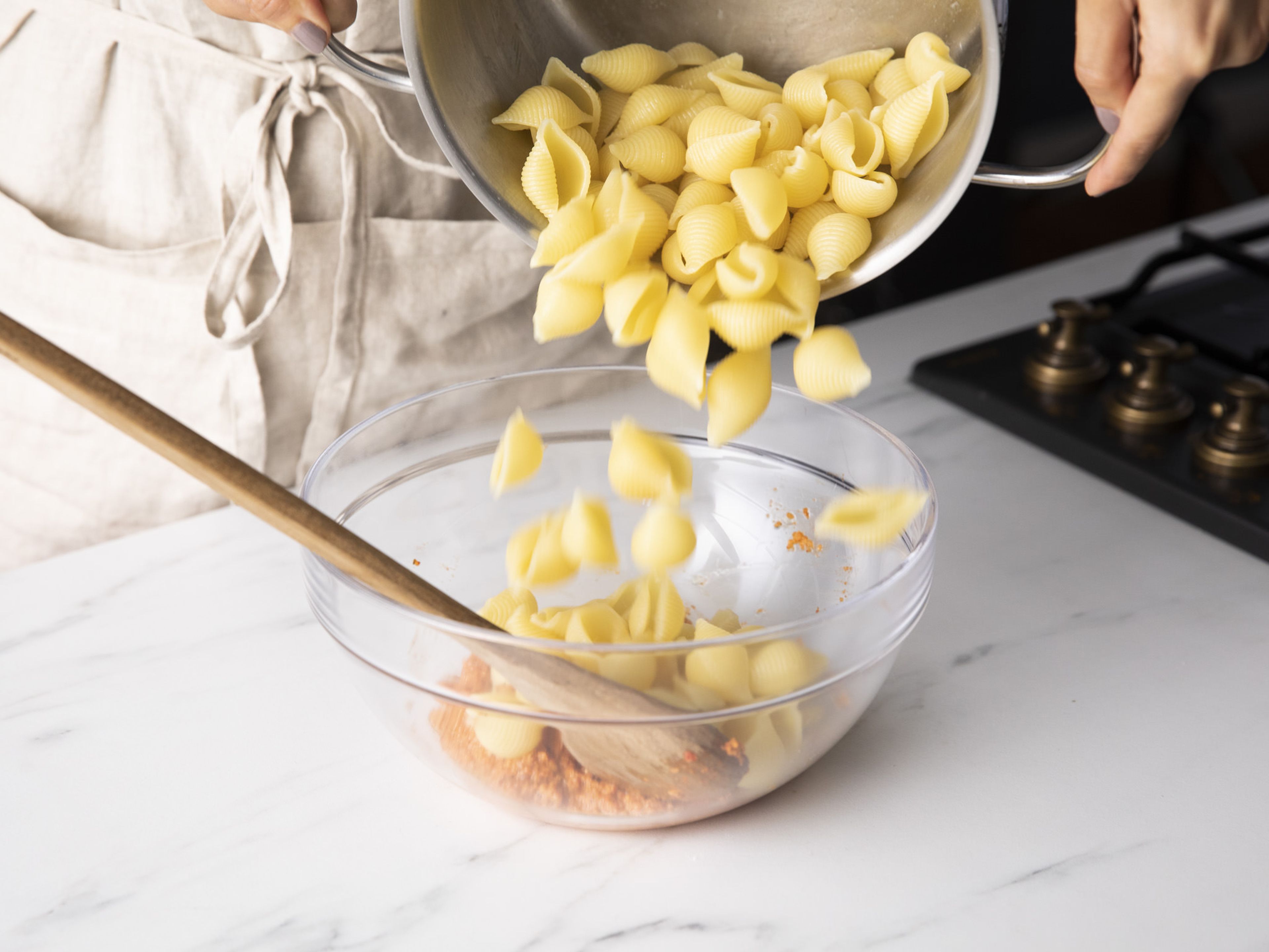Bring a pot of water to boil over high heat. Generously salt and cook pasta until al dente. Drain and add to a large bowl. Toss with the pesto. Serve pasta with a sprinkle of the remaining thyme leaves. Season to taste and enjoy!