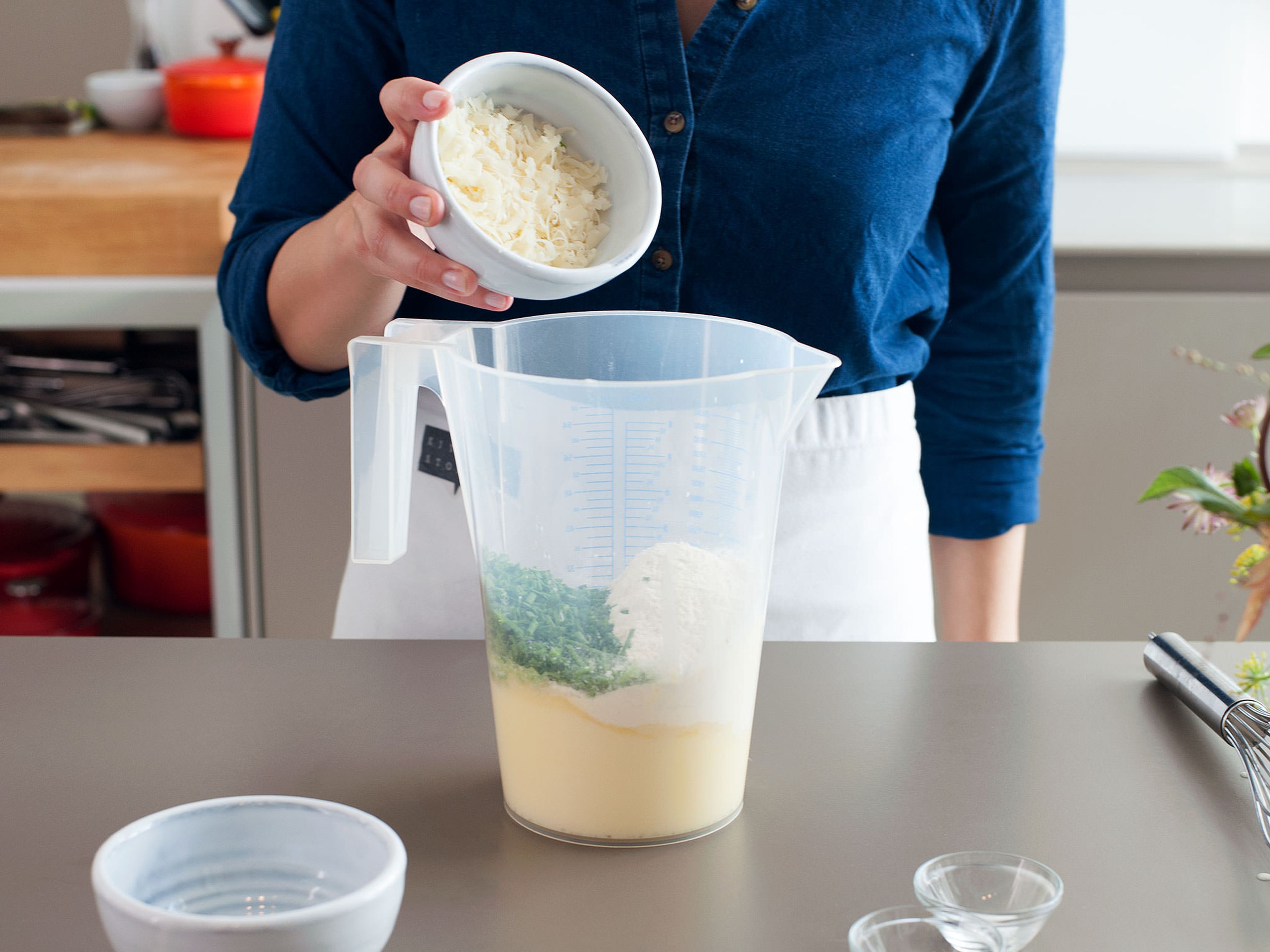 Add cheese, chives, flour, pepper, and salt, and stir to combine.