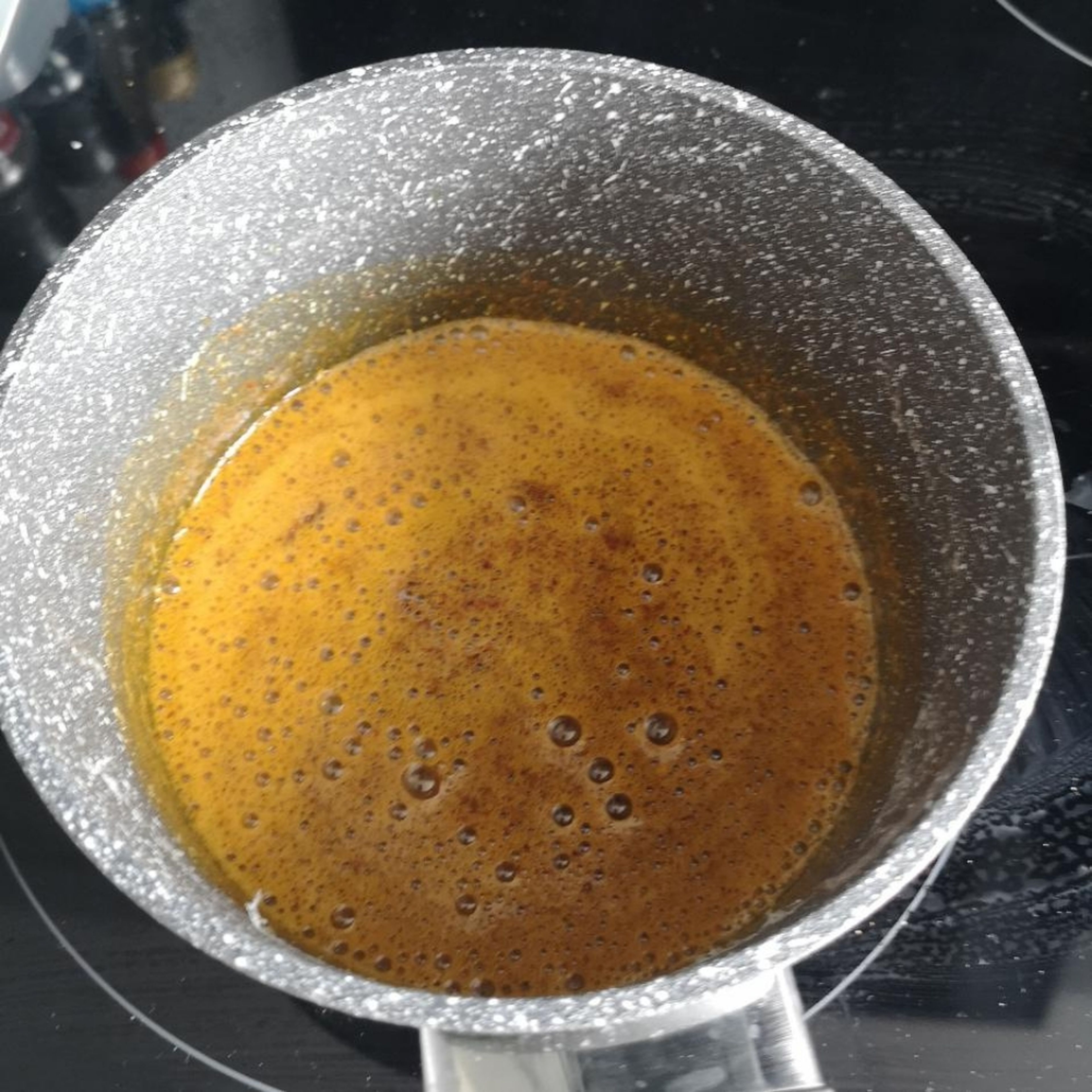 brown the butter and add the chili and Aleppo pepper to it till it foams, remove from the fire.
