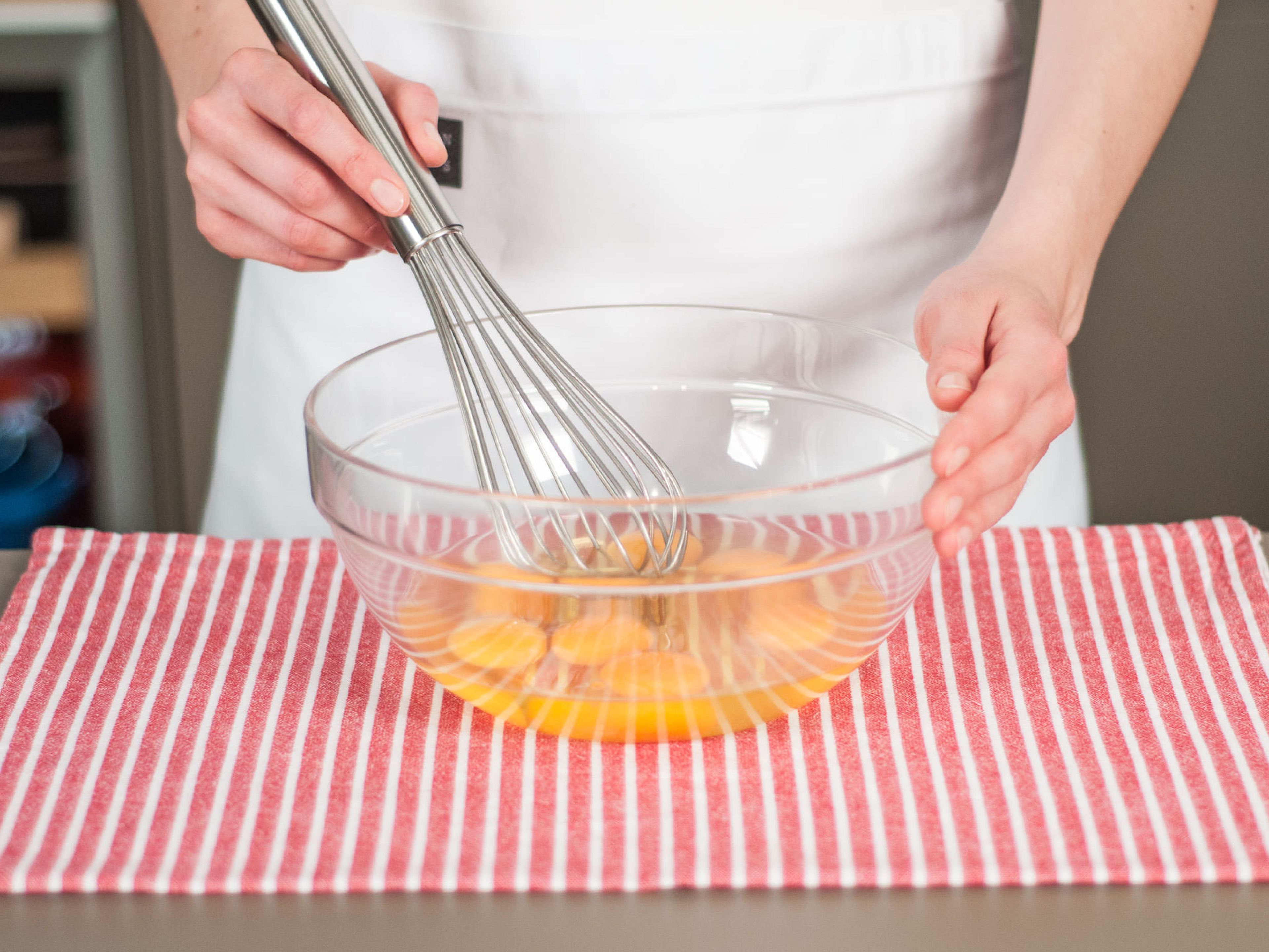 Add eggs to a large bowl, whisk until creamy, and season with salt and pepper. Set aside.